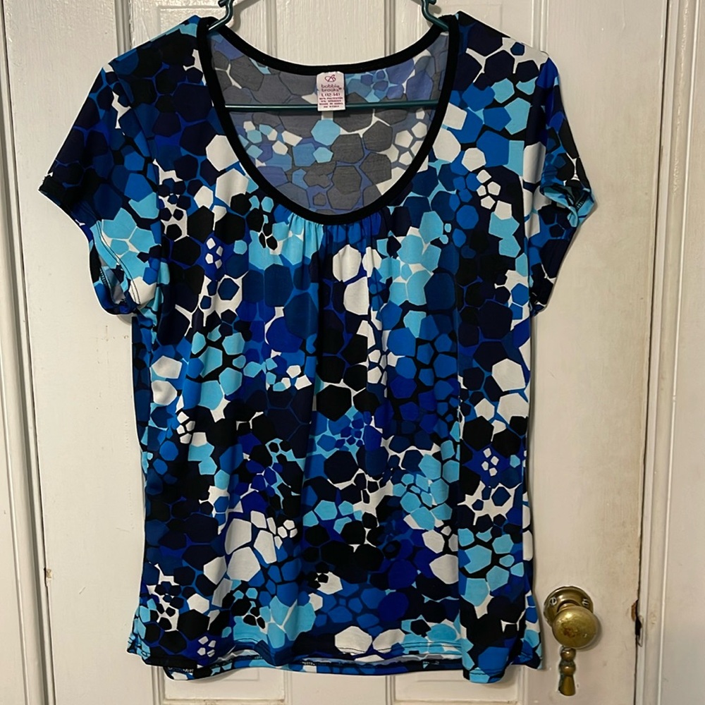 Multi color blouse. Size large (12-14).